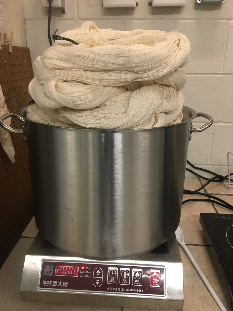 Scouring cotton yarn - cotton floating on top of water