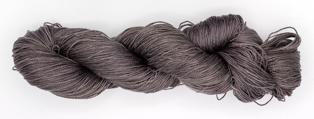 Hand-Dyed 5/2 Tencel™ 4 oz yarn skein - Naturally dyed by Jean Haley Dye + Design. Color 15 - Gray