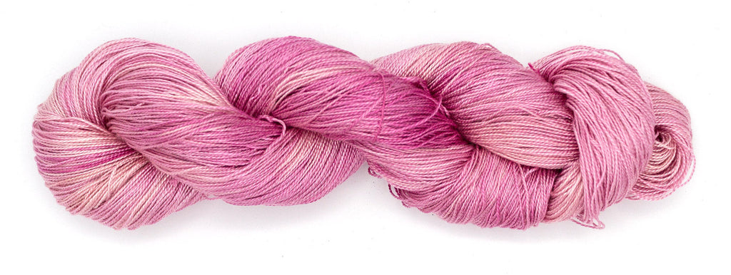 Hand-Dyed 5/2 Tencel™ 4 oz yarn skein - Naturally dyed by Jean Haley Dye + Design. Color 6 - Variegated Pink