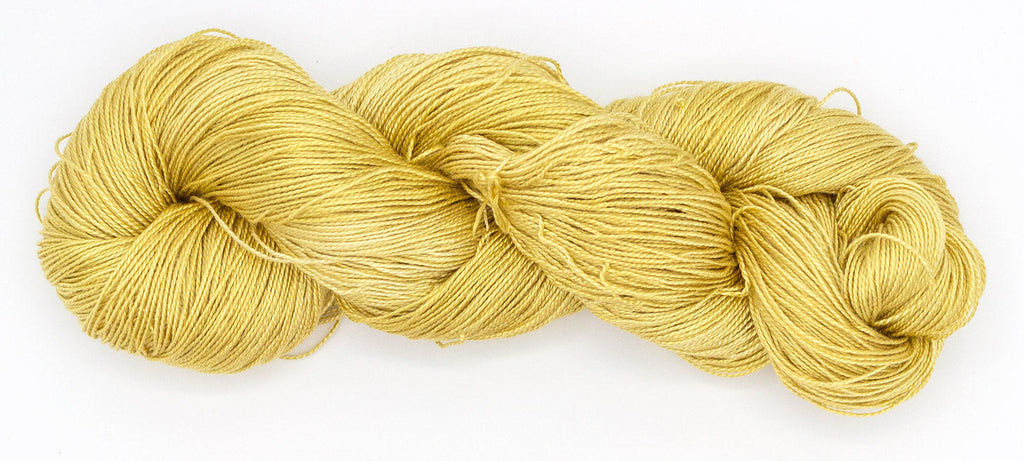 Hand-Dyed 5/2 Tencel™ 4 oz yarn skein - Naturally dyed by Jean Haley Dye + Design. Color 10 - Yellow