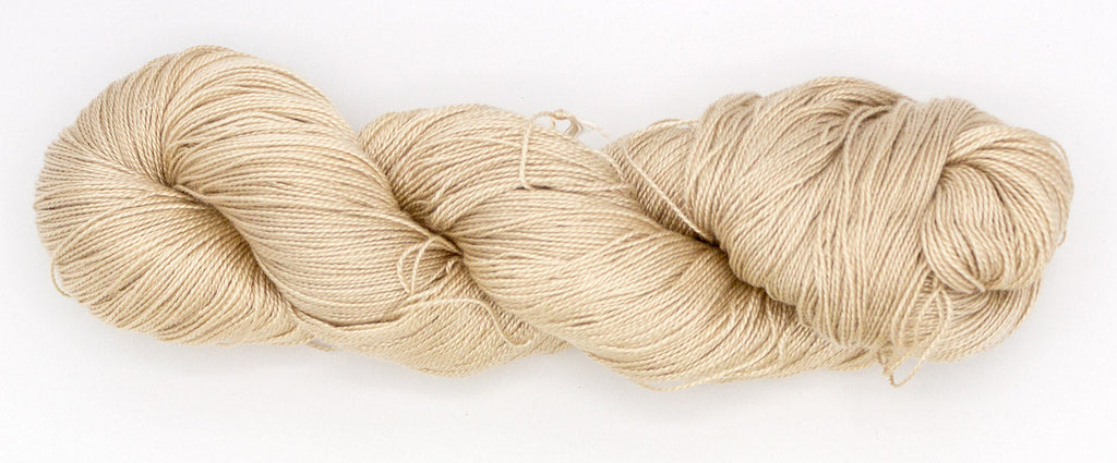 Hand-Dyed 5/2 Tencel™ 4 oz yarn skein - Naturally dyed by Jean Haley Dye + Design. Color 12 - Pale Warm Tan