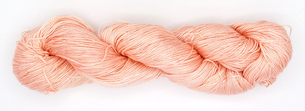 Hand-Dyed 5/2 Tencel™ 4 oz yarn skein - Naturally dyed by Jean Haley Dye + Design. Color 7 - Peach
