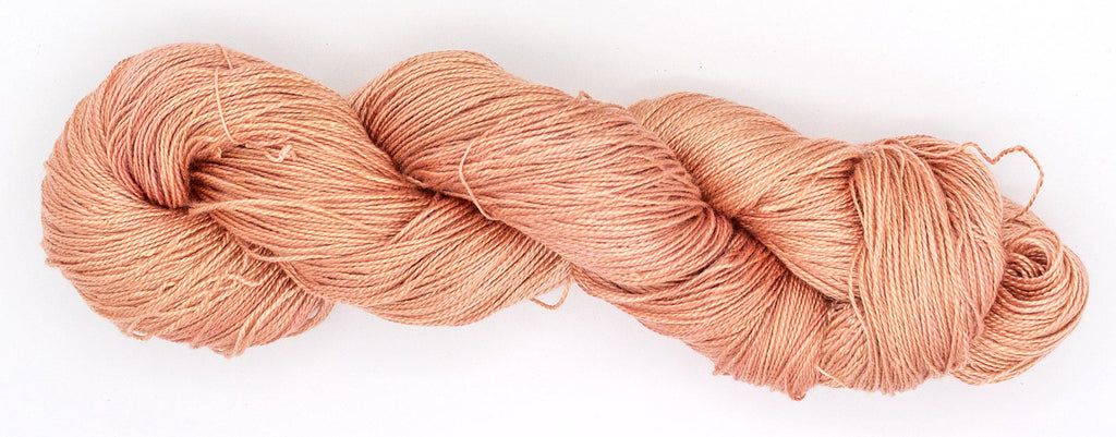 Hand-Dyed 5/2 Tencel™ 4 oz yarn skein - Naturally dyed by Jean Haley Dye + Design. Color 9 - Peach